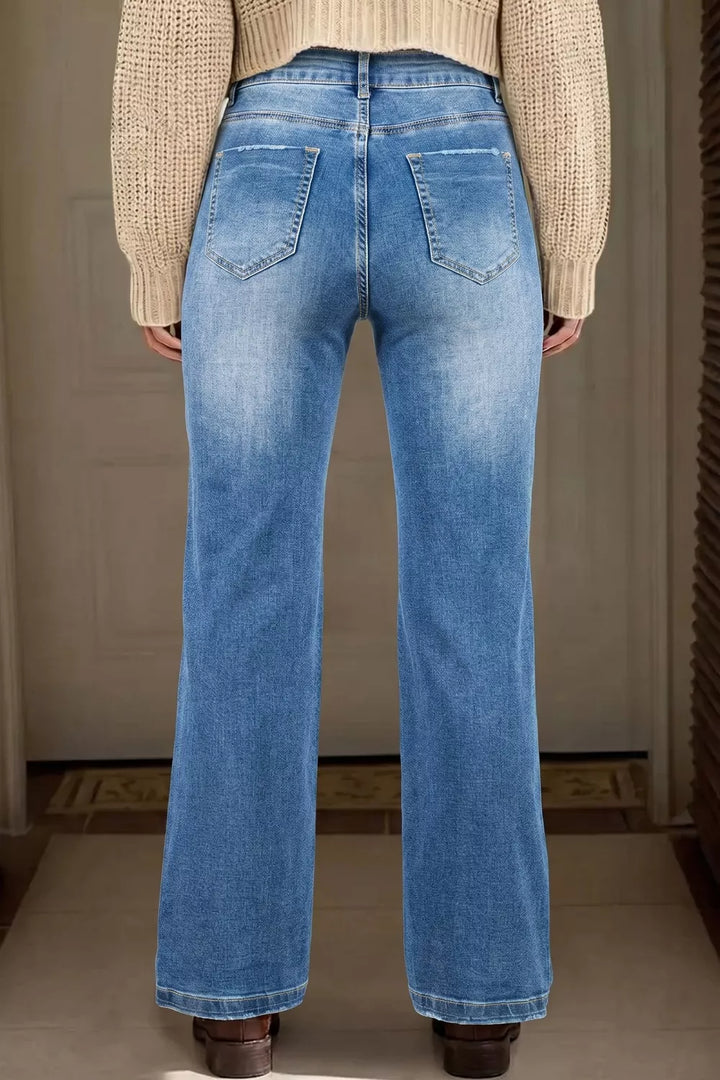 Acid wash straight leg mid rise stretch jeans