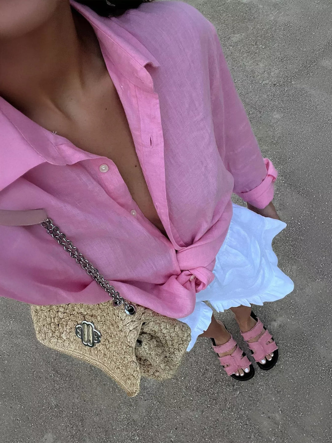 Relaxed cotton button-up shirt with curved hem
