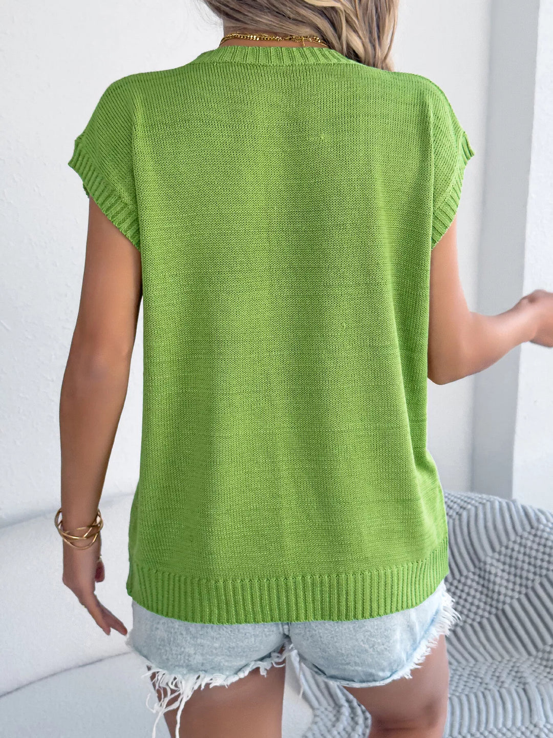 Floral cap-sleeve knit sweater with ribbed crew neck