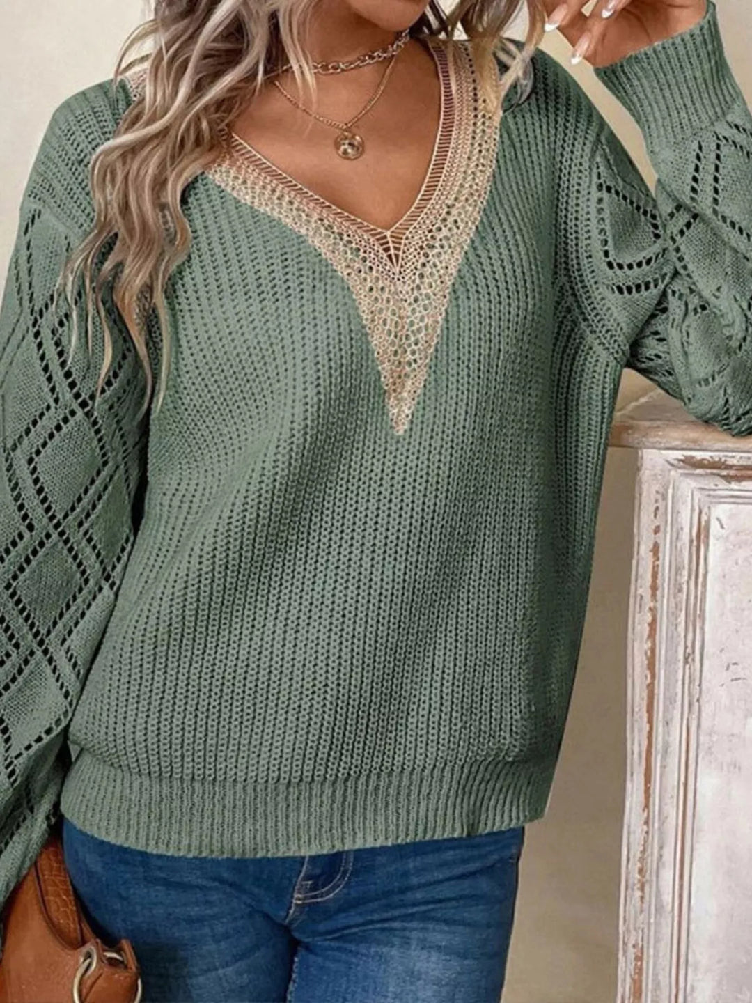 Openwork diamond sleeve ribbed knit V-neck sweater