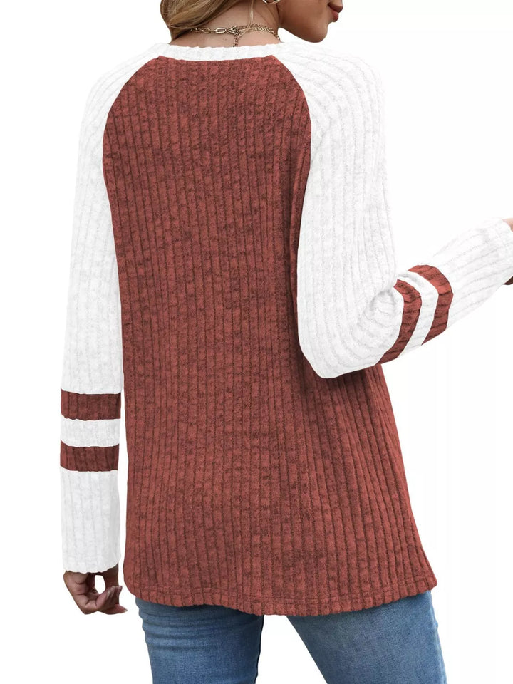 Ribbed knit raglan long sleeve top with varsity stripe sleeves