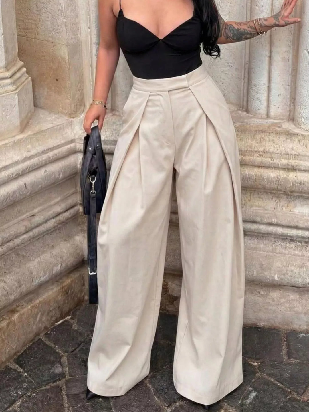 High-rise pleated wide leg pants with deep front pleats