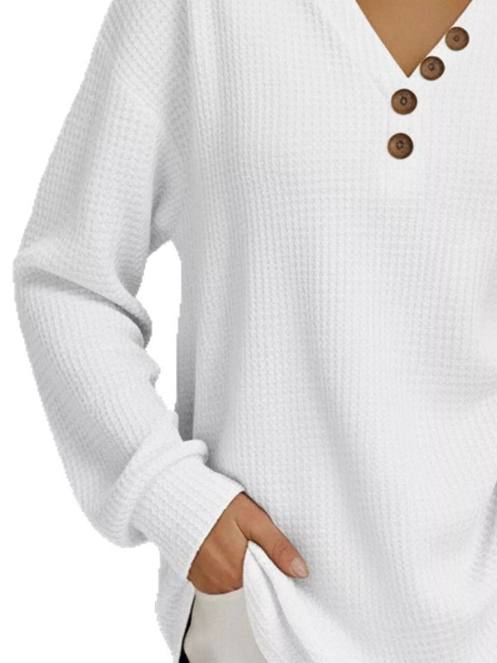 Waffle-knit long sleeve henley top with buttoned V-neck