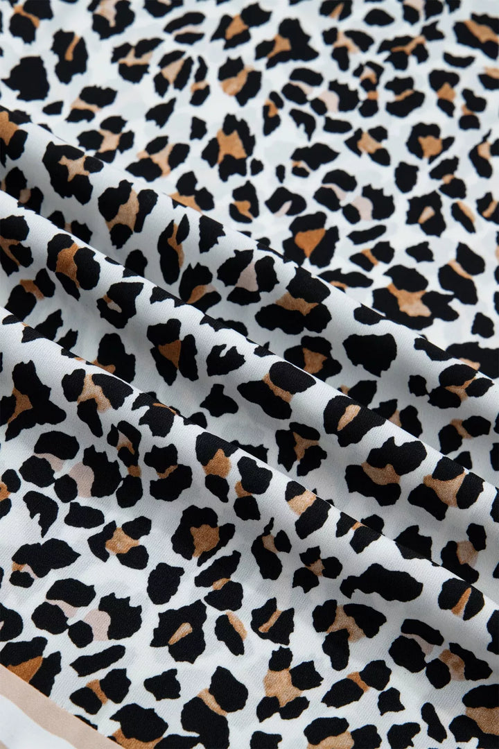 Leopard print tiered midi dress with contrast trim