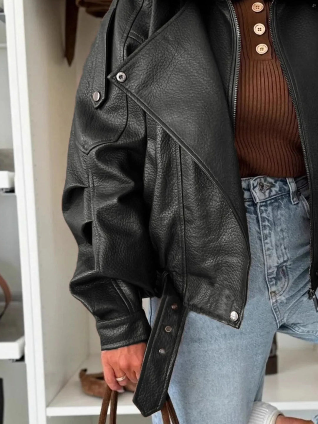 Oversized faux leather moto jacket with belted hem