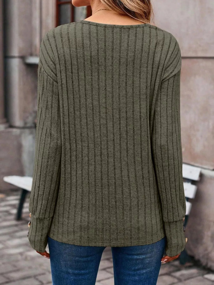 Ribbed knit V-neck top with buttoned cuffs