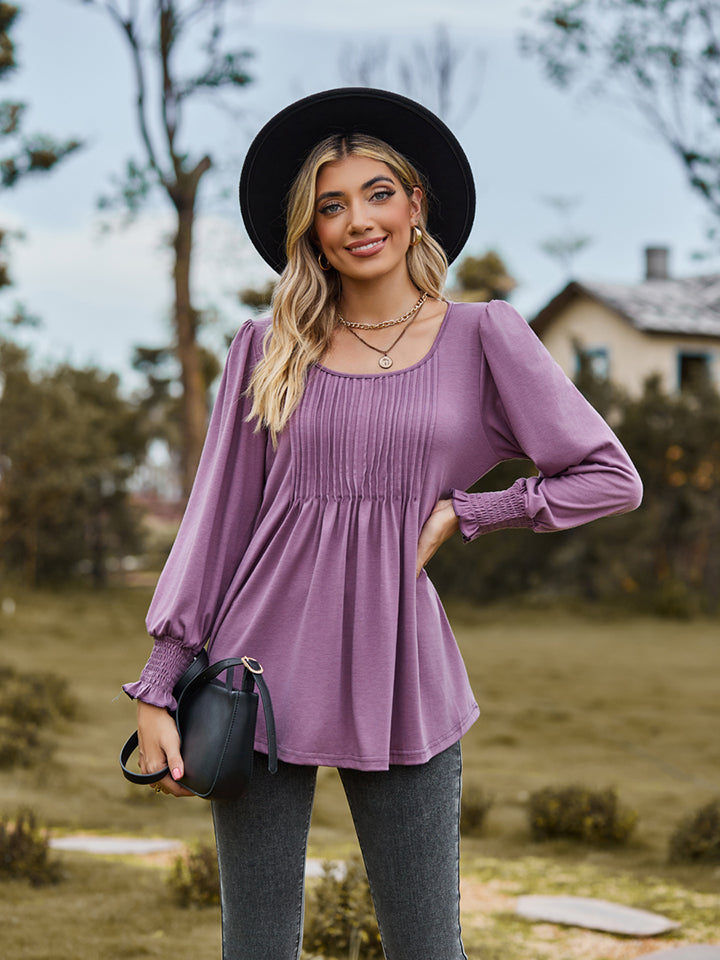 Pintuck pleated puff sleeve blouse with smocked cuffs