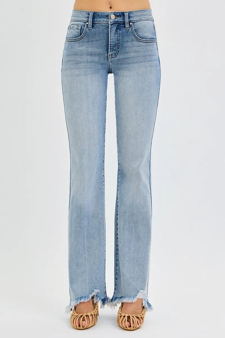 Mid-rise flare jeans with frayed raw hem and tummy control