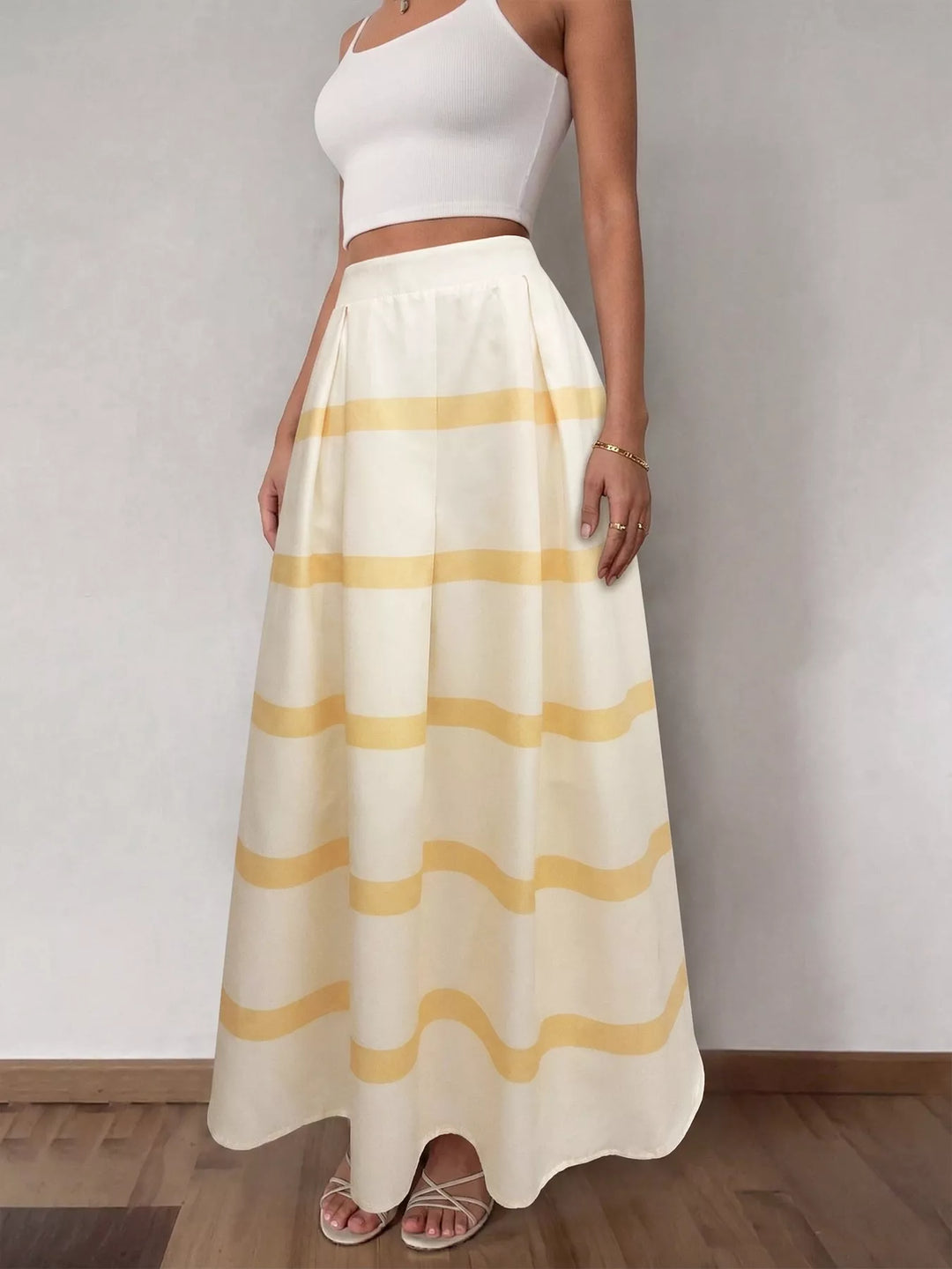 Striped pleated A-line maxi skirt with pockets