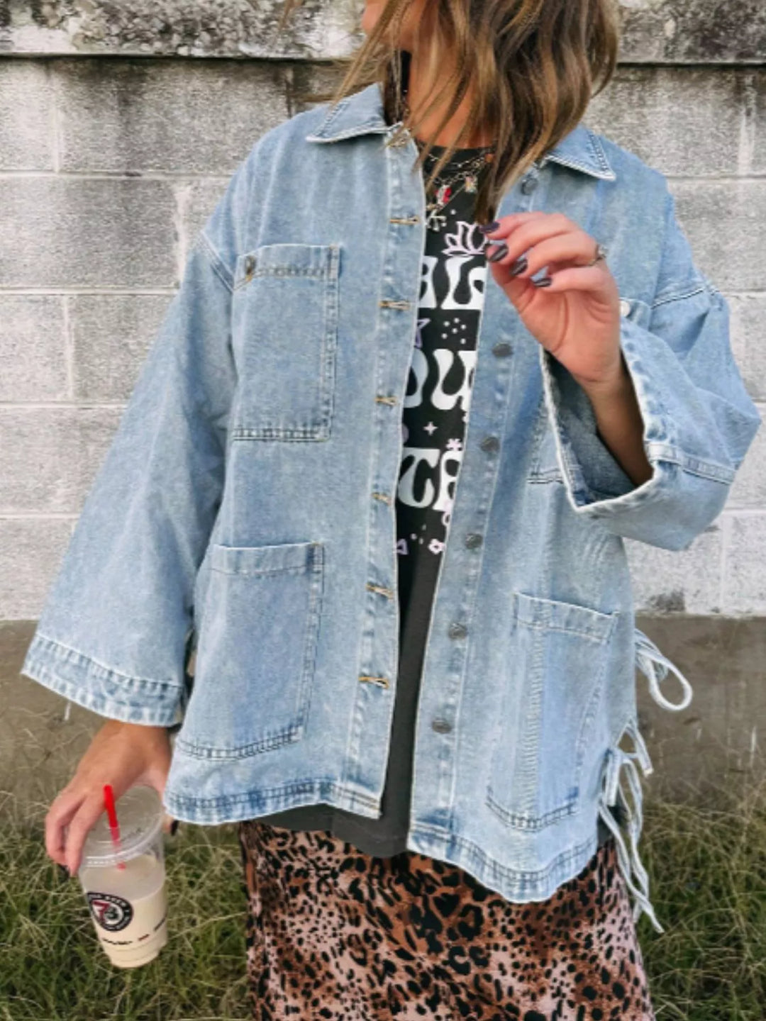 Oversized denim jacket with patch pockets and side ties