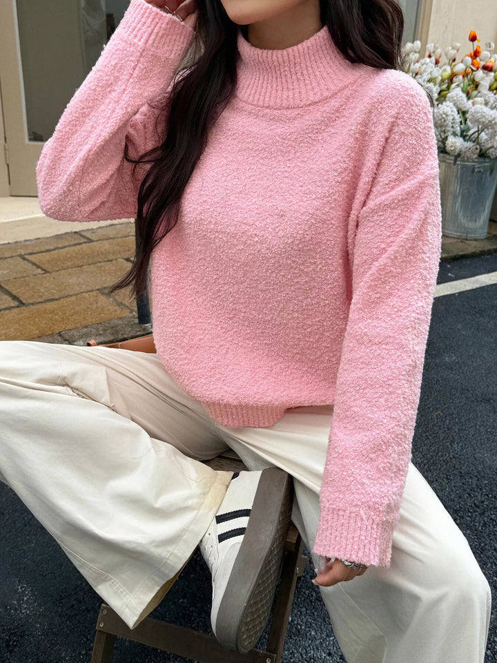 Pink Textured knit turtleneck sweater with drop shoulders