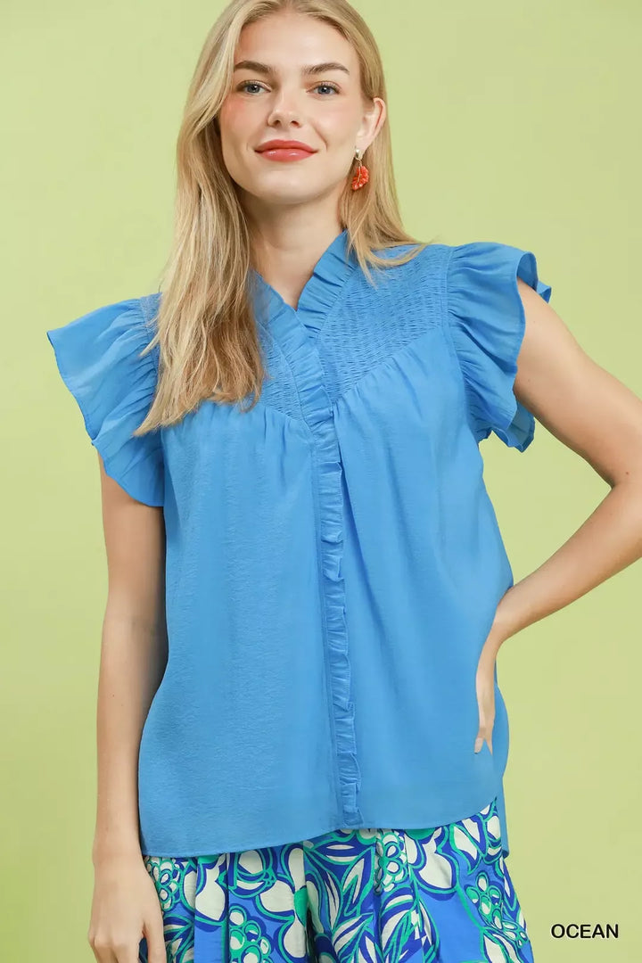 OCEAN Smocked yoke flutter sleeve blouse with ruffle placket