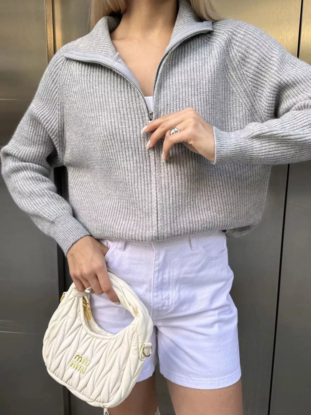 Zip-up ribbed knit cardigan with funnel neck and drop shoulders