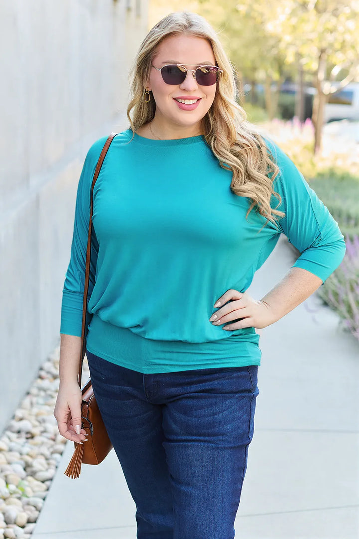 Batwing sleeve top with banded blouson hem