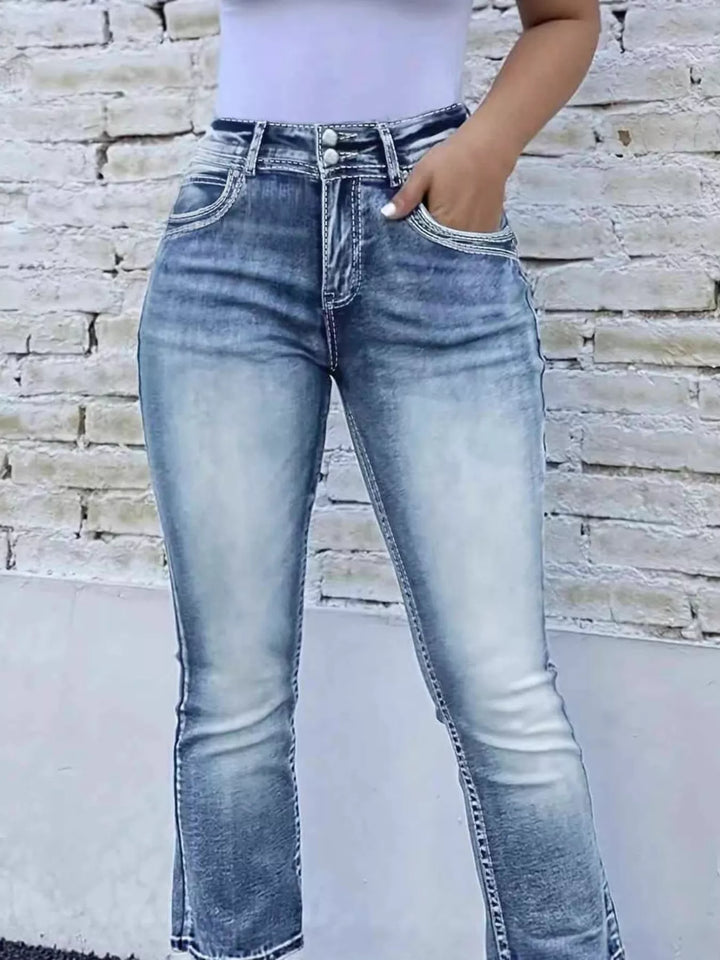 High-rise bootcut jeans with faded whiskering