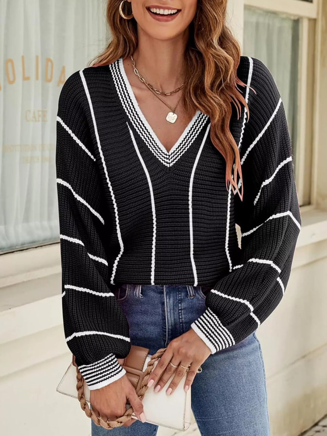 Striped V-neck ribbed knit sweater with drop shoulders