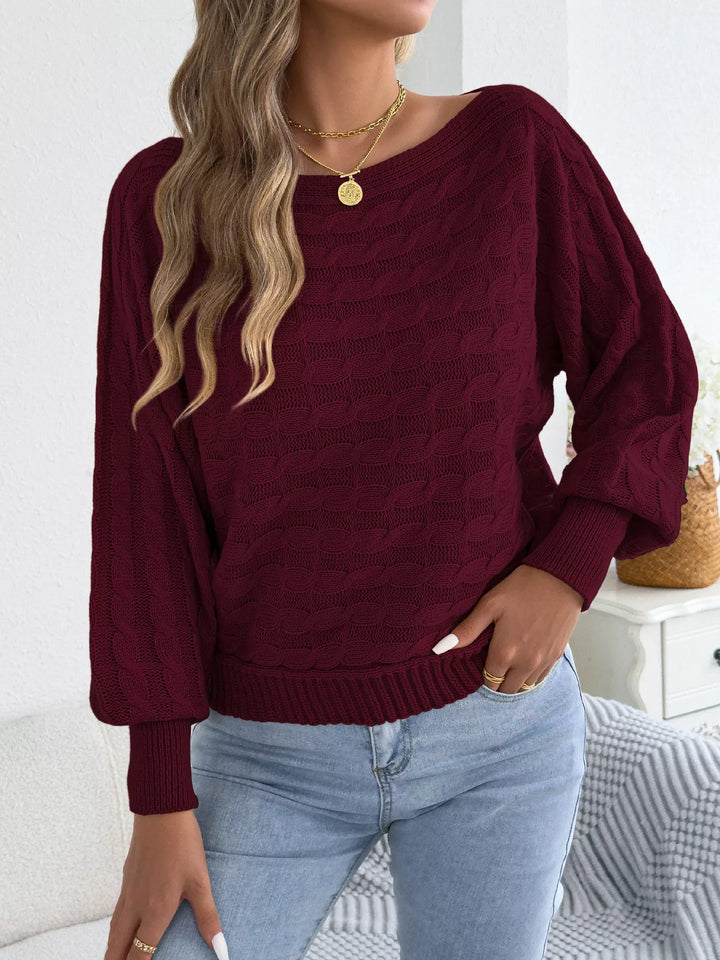 Cable knit boat neck sweater with dolman sleeves