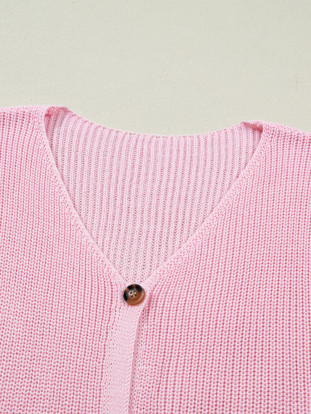 V-neck button-front knit sweater vest with patch pockets