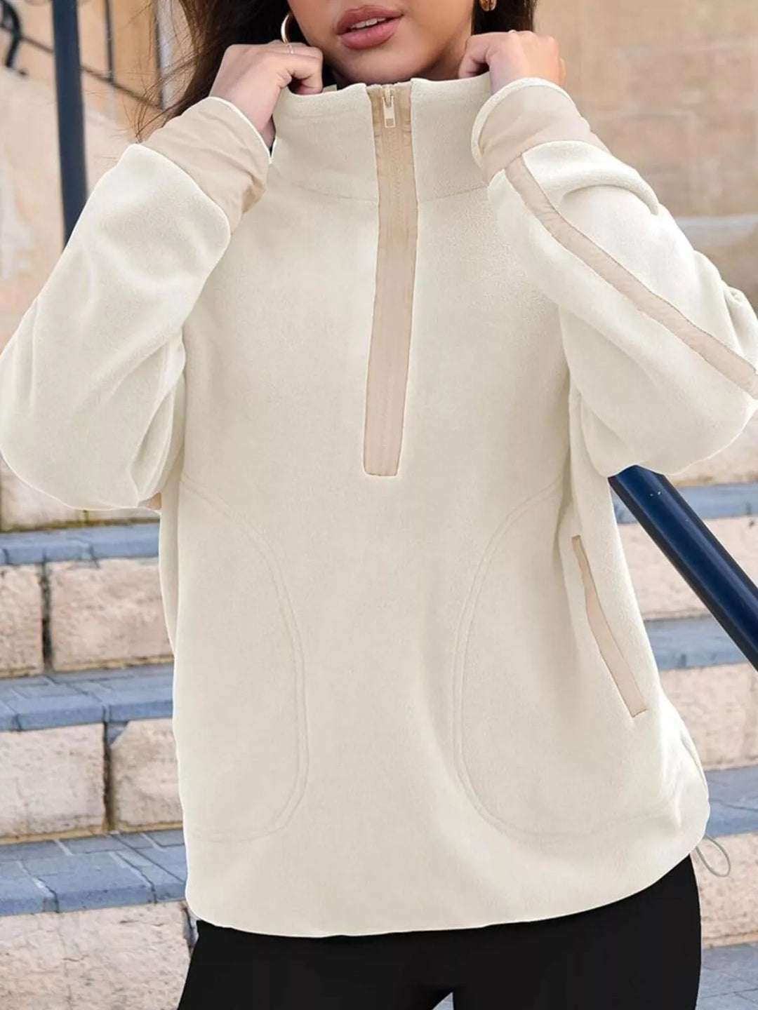 Half-zip fleece pullover with contrast trim and zip pockets