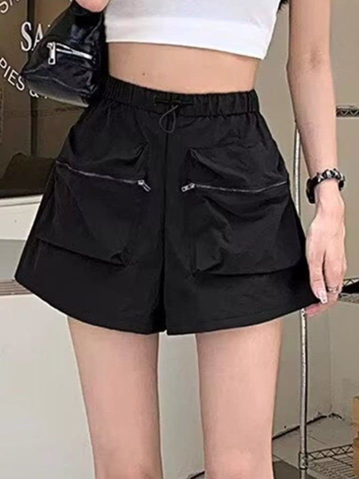 High-rise cargo shorts with zip pockets and drawstring waist