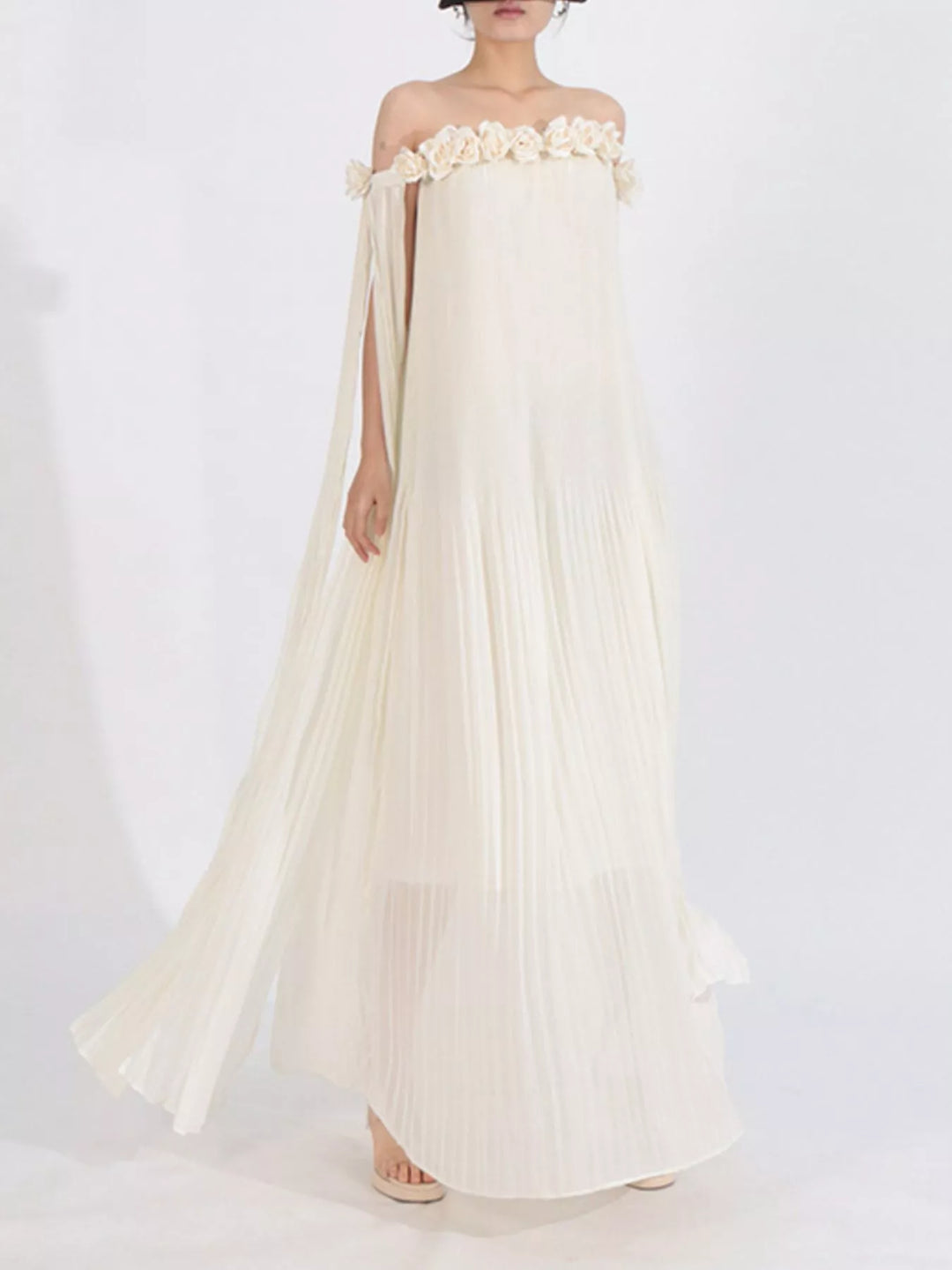 Off-shoulder pleated maxi dress with rosette neckline