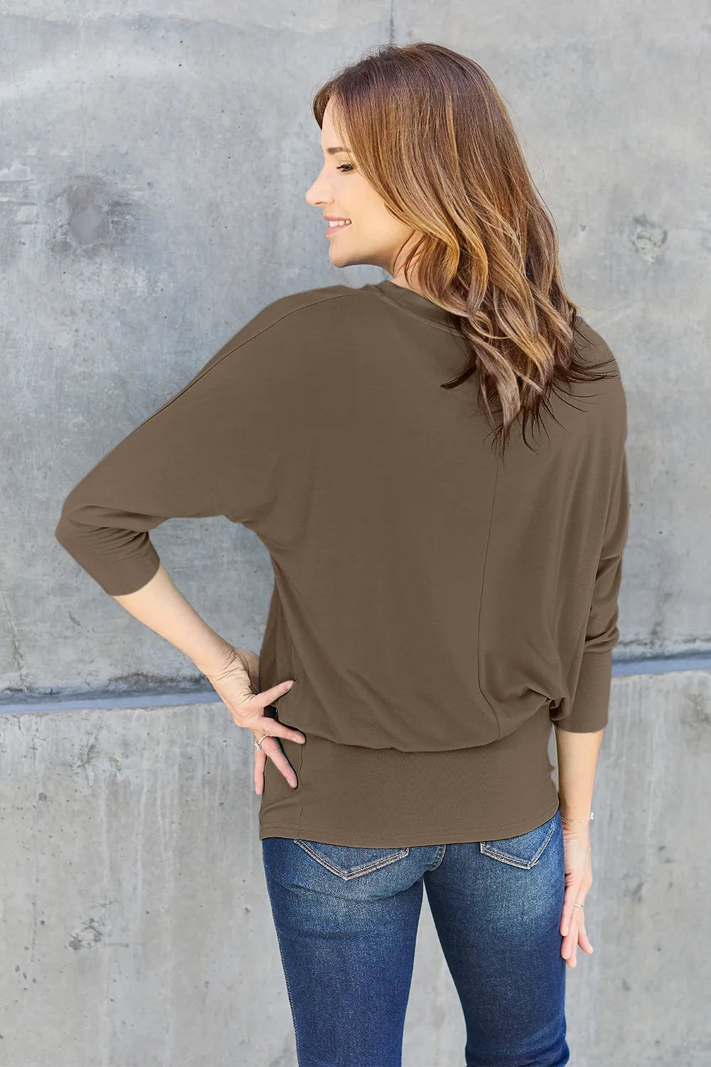 Batwing sleeve top with banded blouson hem