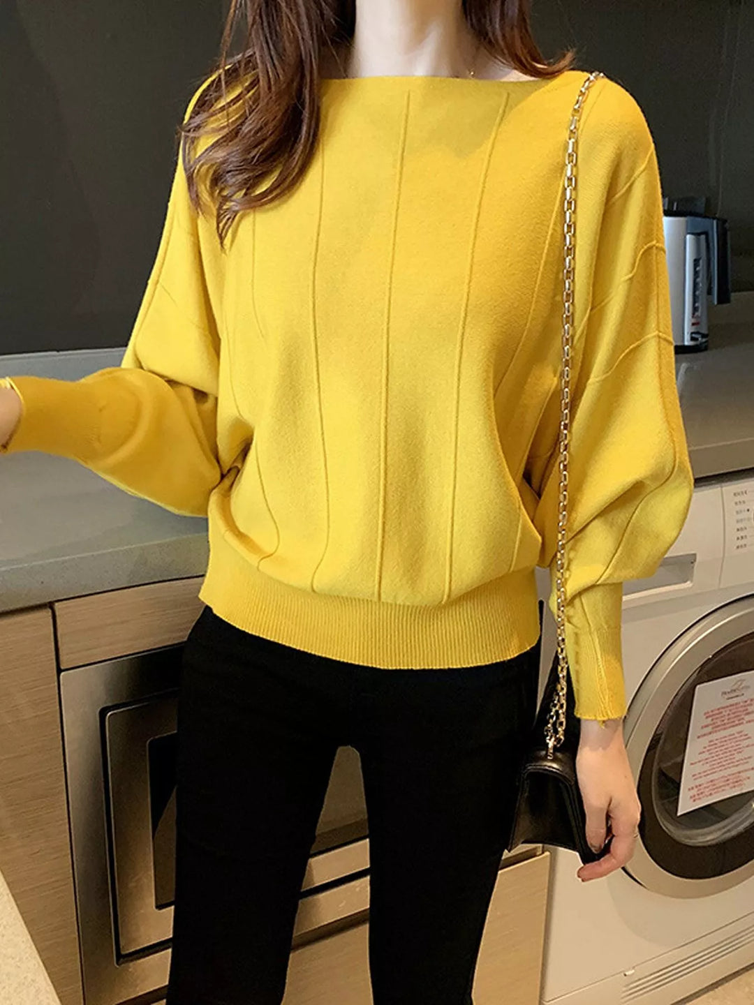 Boat neck batwing sleeve knit pullover with ribbed hem