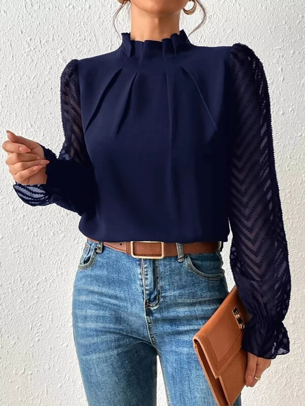 Navy Mock neck blouse with sheer textured flounce sleeves