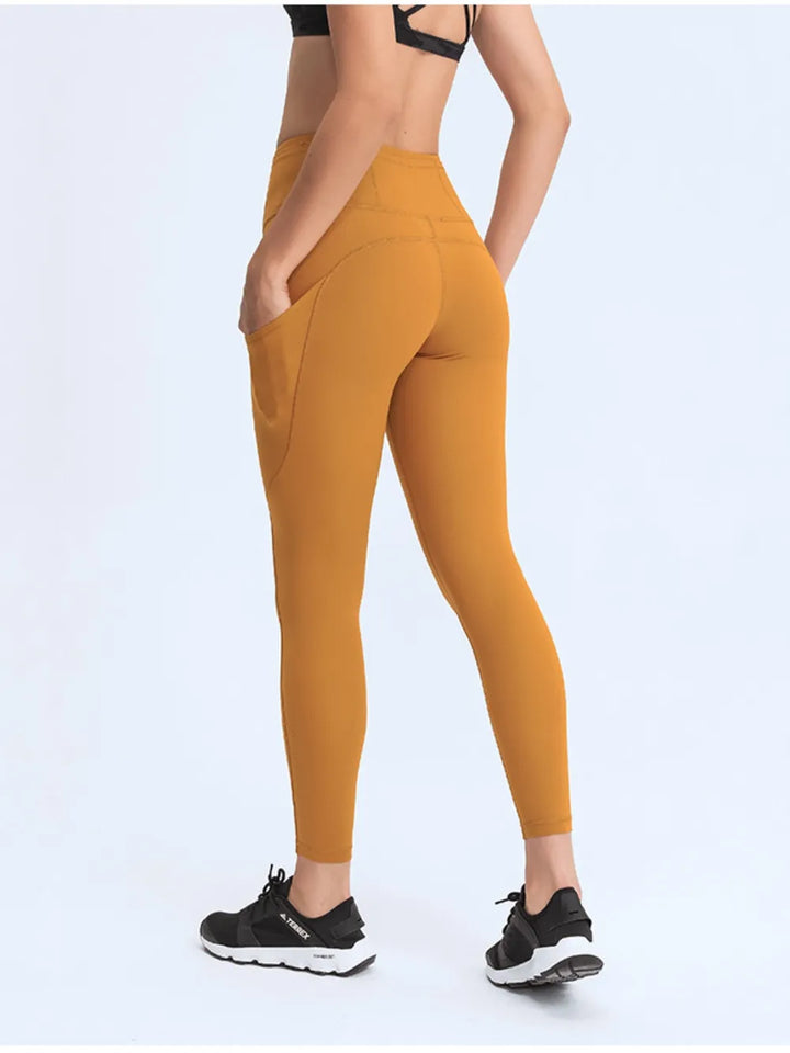 Wide waistband high-rise leggings with side pockets