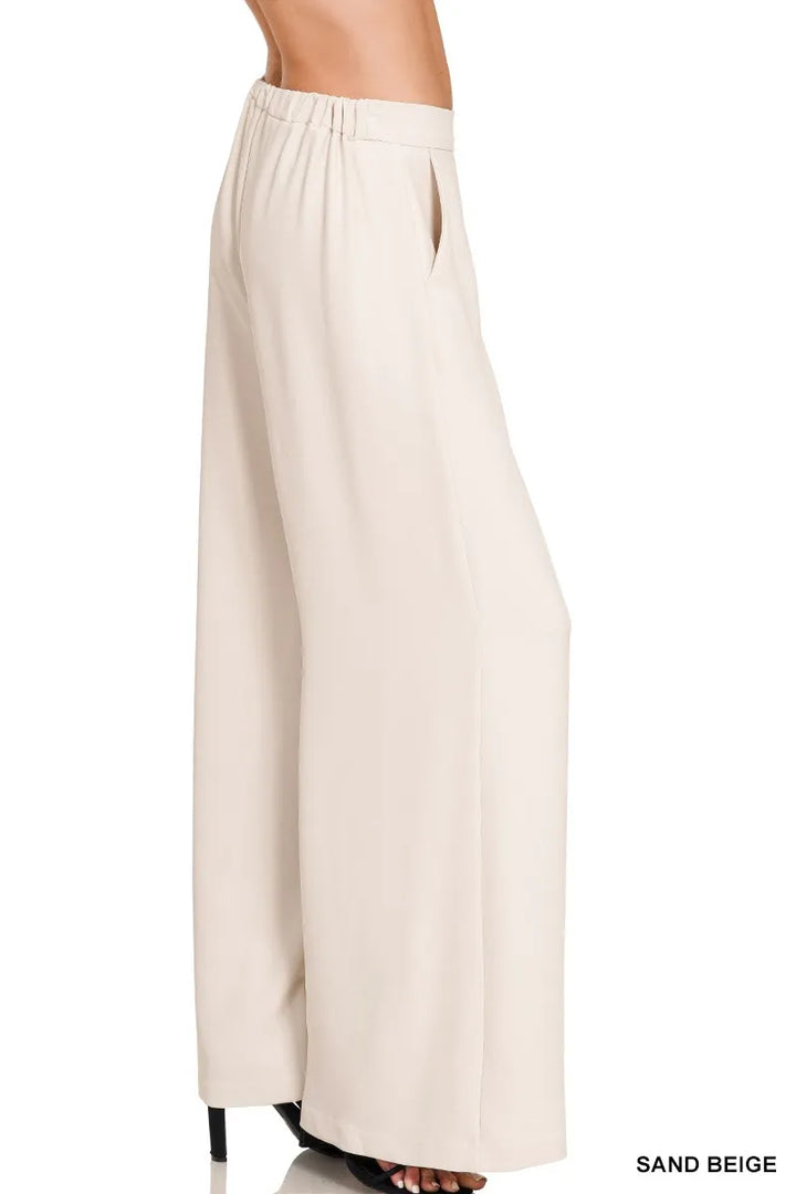 Relaxed wide-leg palazzo pants with elastic waist and pockets