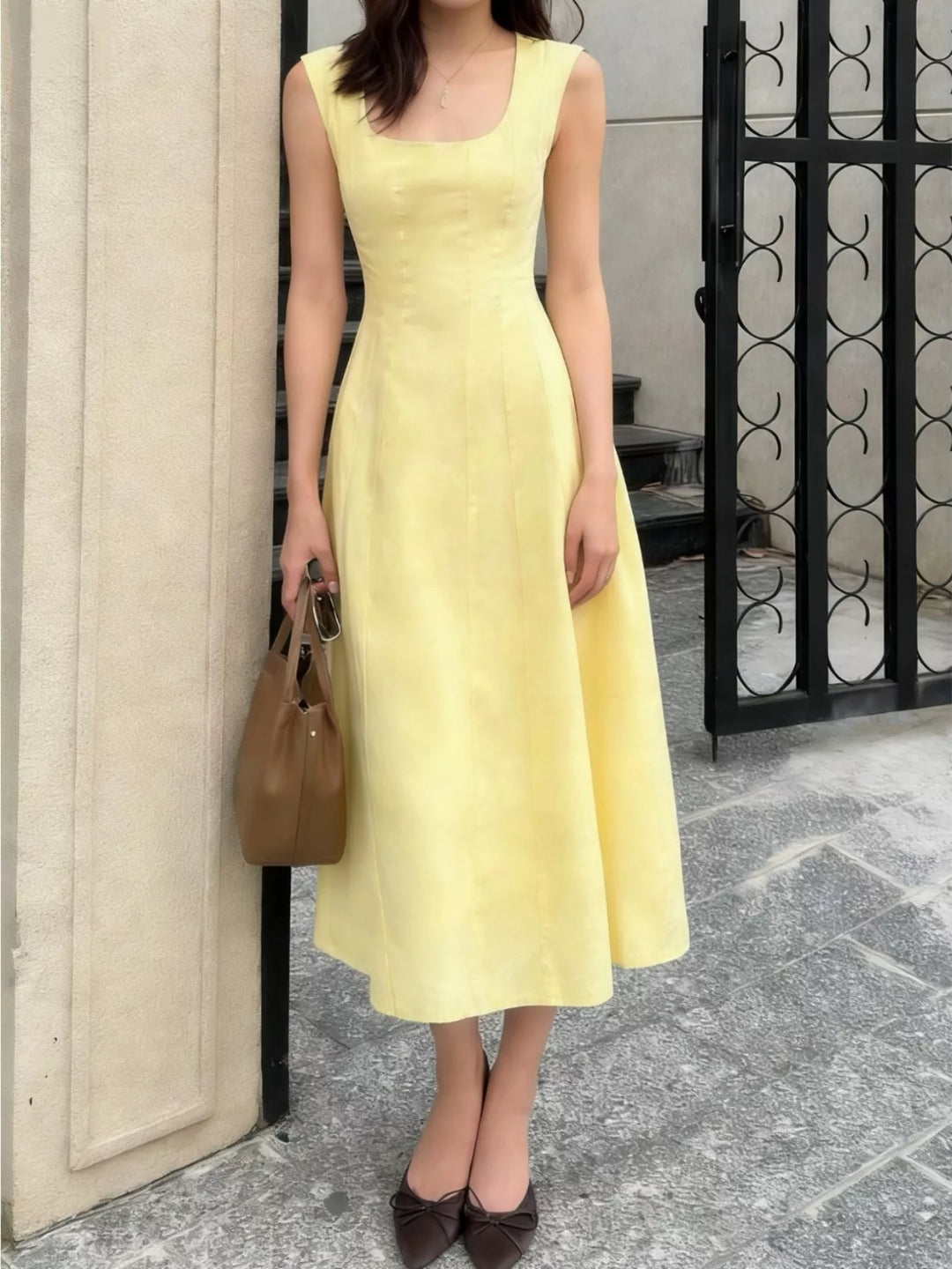 Sleeveless princess-seam A-line midi dress with scoop neck