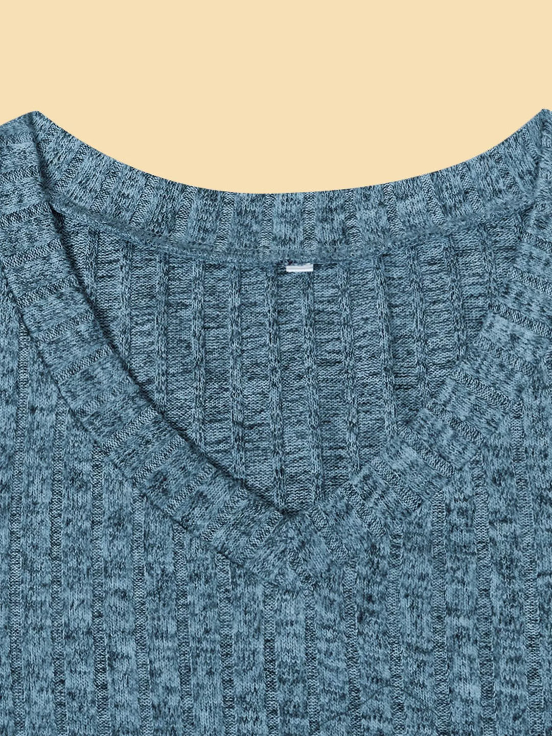 Ribbed knit V-neck long sleeve top with drop shoulders