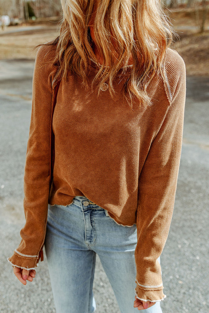 Waffle knit raglan sleeve top with ruffle cuffs