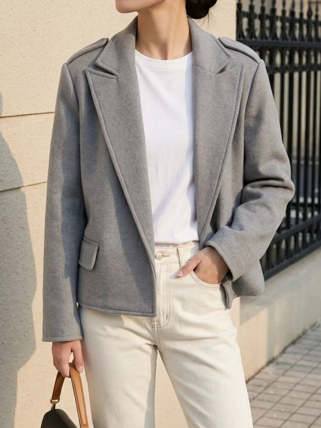 Notch lapel cropped jacket with epaulettes and flap pockets
