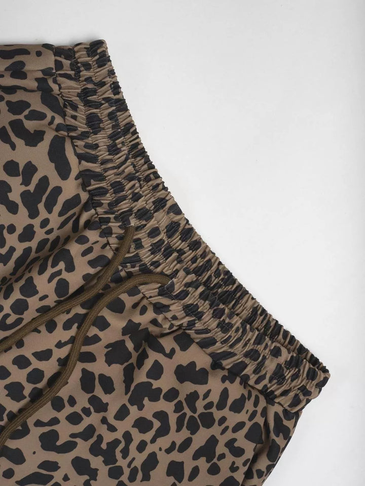 Leopard print wide-leg pants with drawstring waist