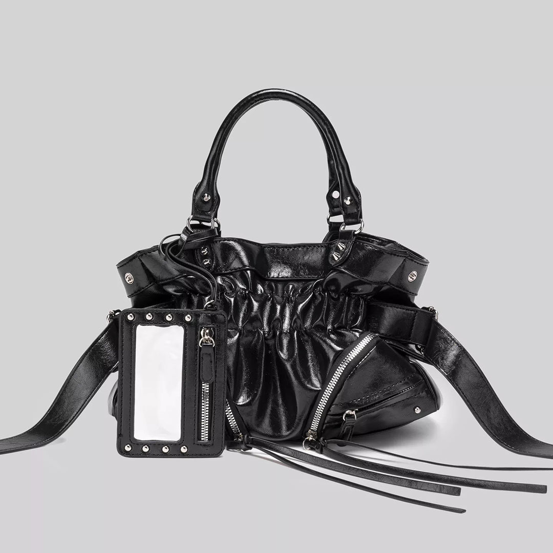 Ruched faux leather crossbody bag with studded mirror charm