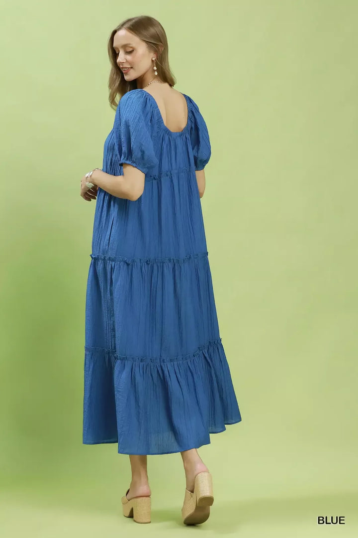 Textured tiered midi dress with puff sleeves and pockets