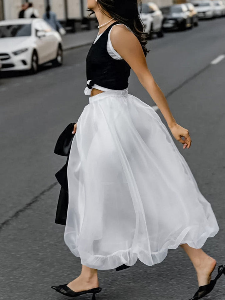 Semi-sheer flowy midi skirt with gathered elastic waist