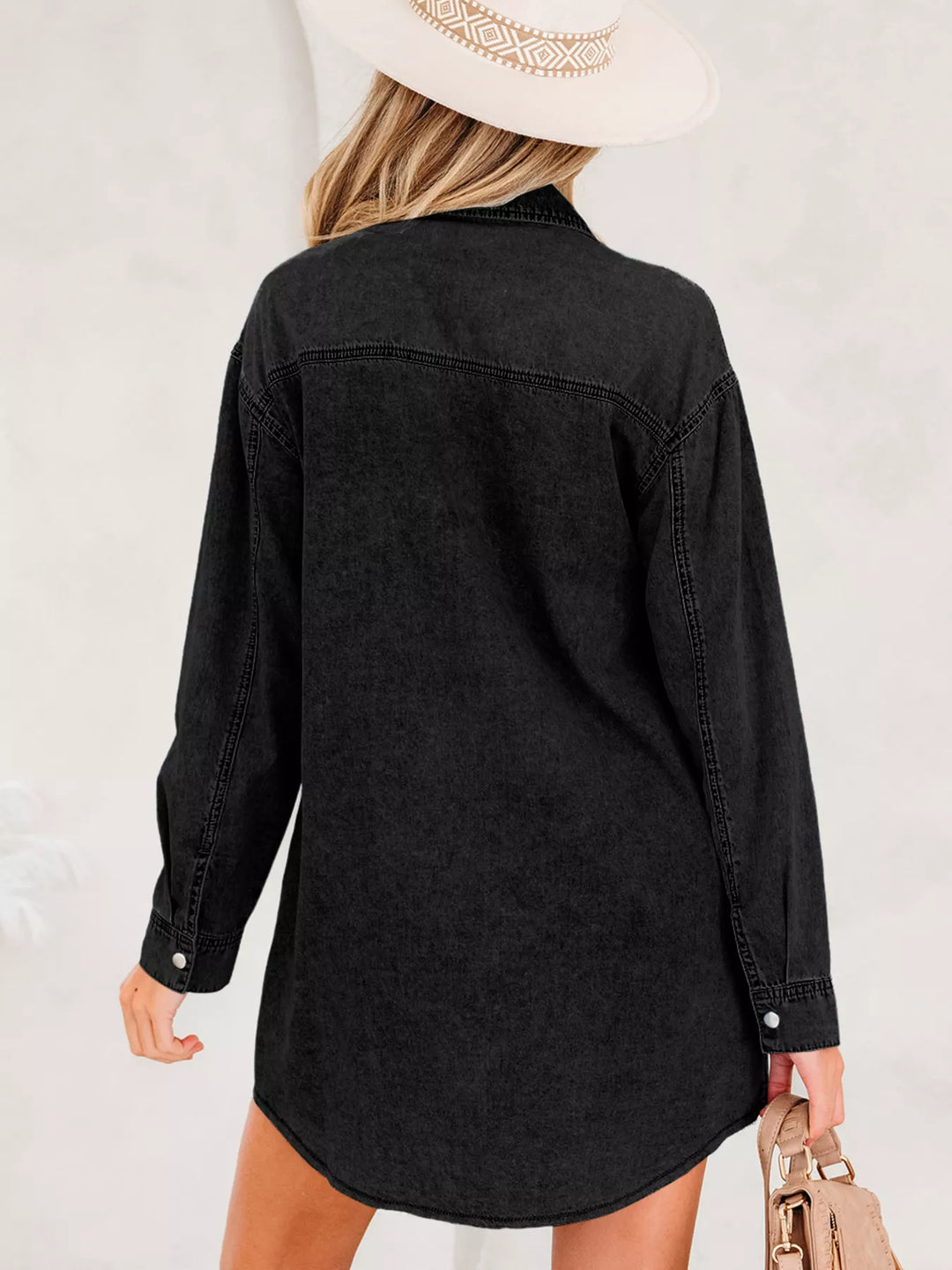 Loose-fit denim shirt dress with raw hem and chest pockets