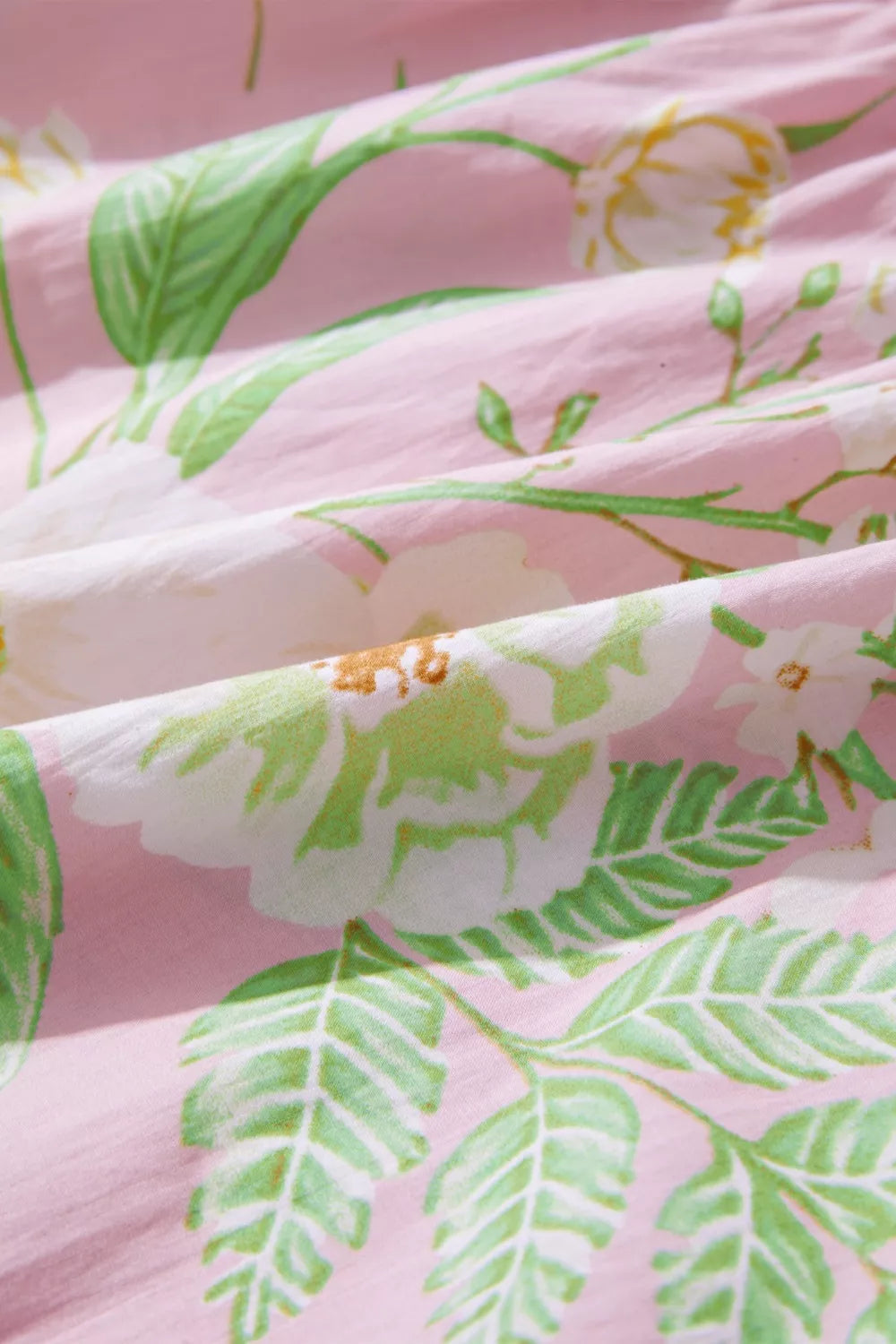 Tiered floral maxi dress with puff sleeves and pockets
