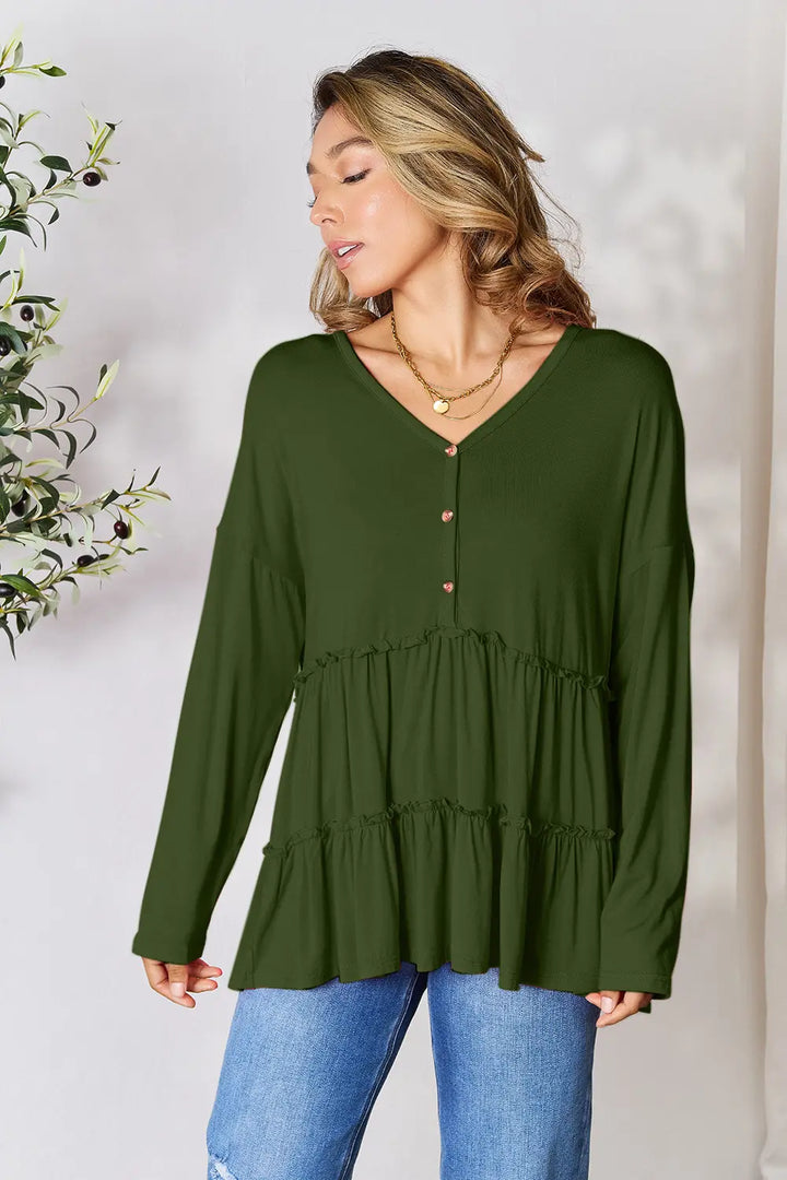 Half-button long sleeve blouse with tiered ruffle hem
