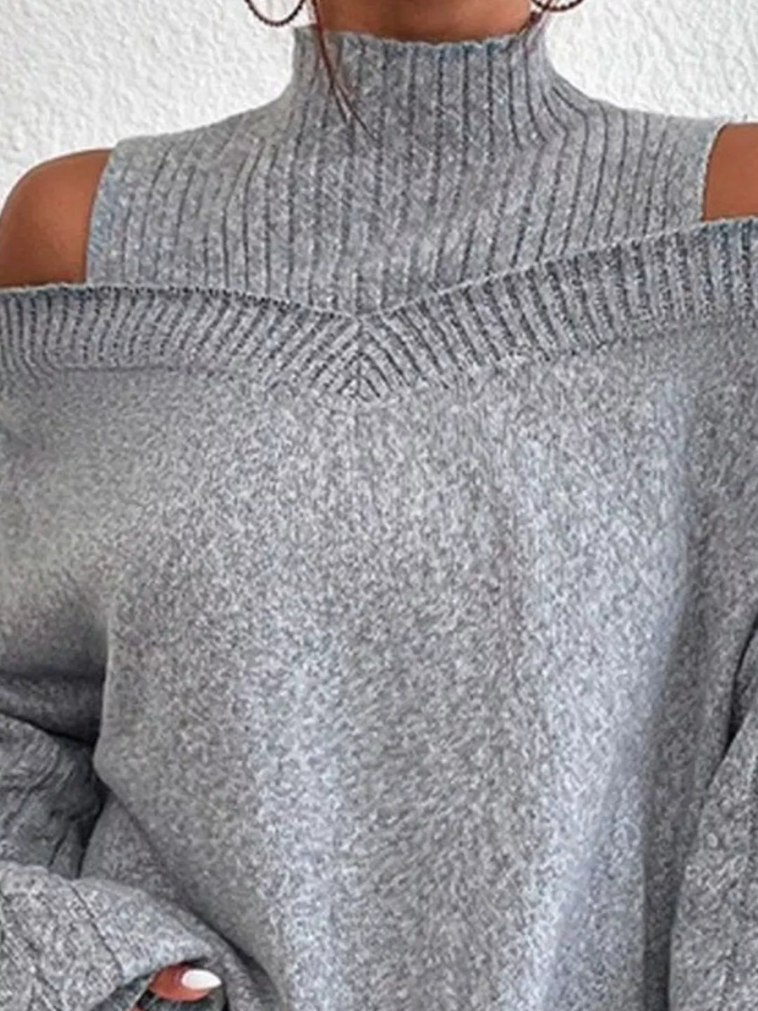 Cold-shoulder cable-knit turtleneck sweater