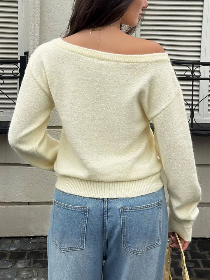 Boat neck dropped shoulder knit sweater with ribbed trim