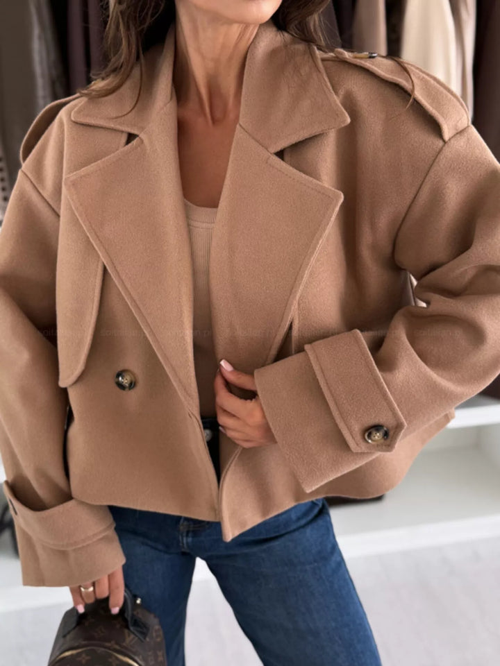 Double-breasted cropped coat with notch lapels and button cuffs
