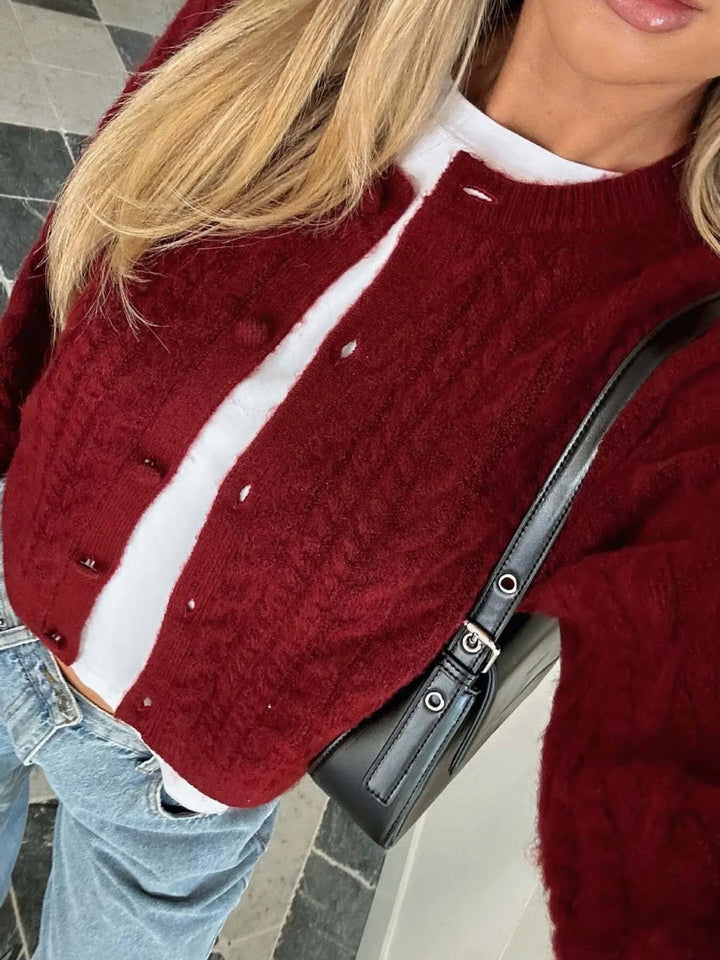 Cropped cable knit button-up cardigan with ribbed cuffs
