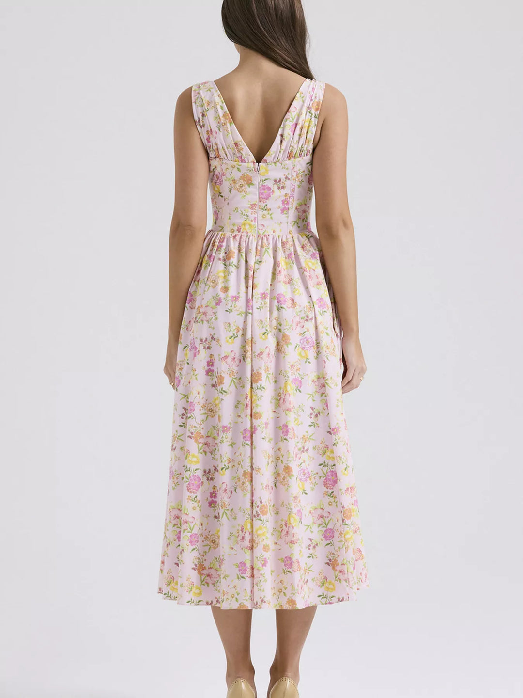 Sleeveless V-neck midi dress with fitted bodice and pockets