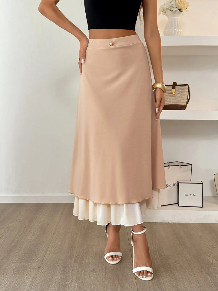 Layered A-line midi skirt with contrast ruffle hem