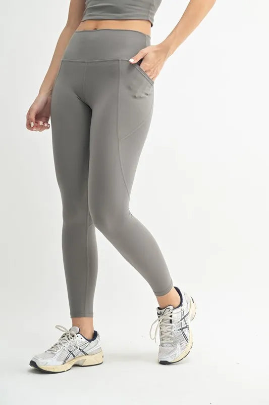 High-waisted sculpting leggings with side pockets