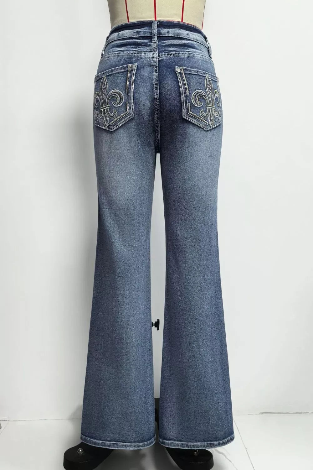 Faded high-rise flare jeans with double-button waist