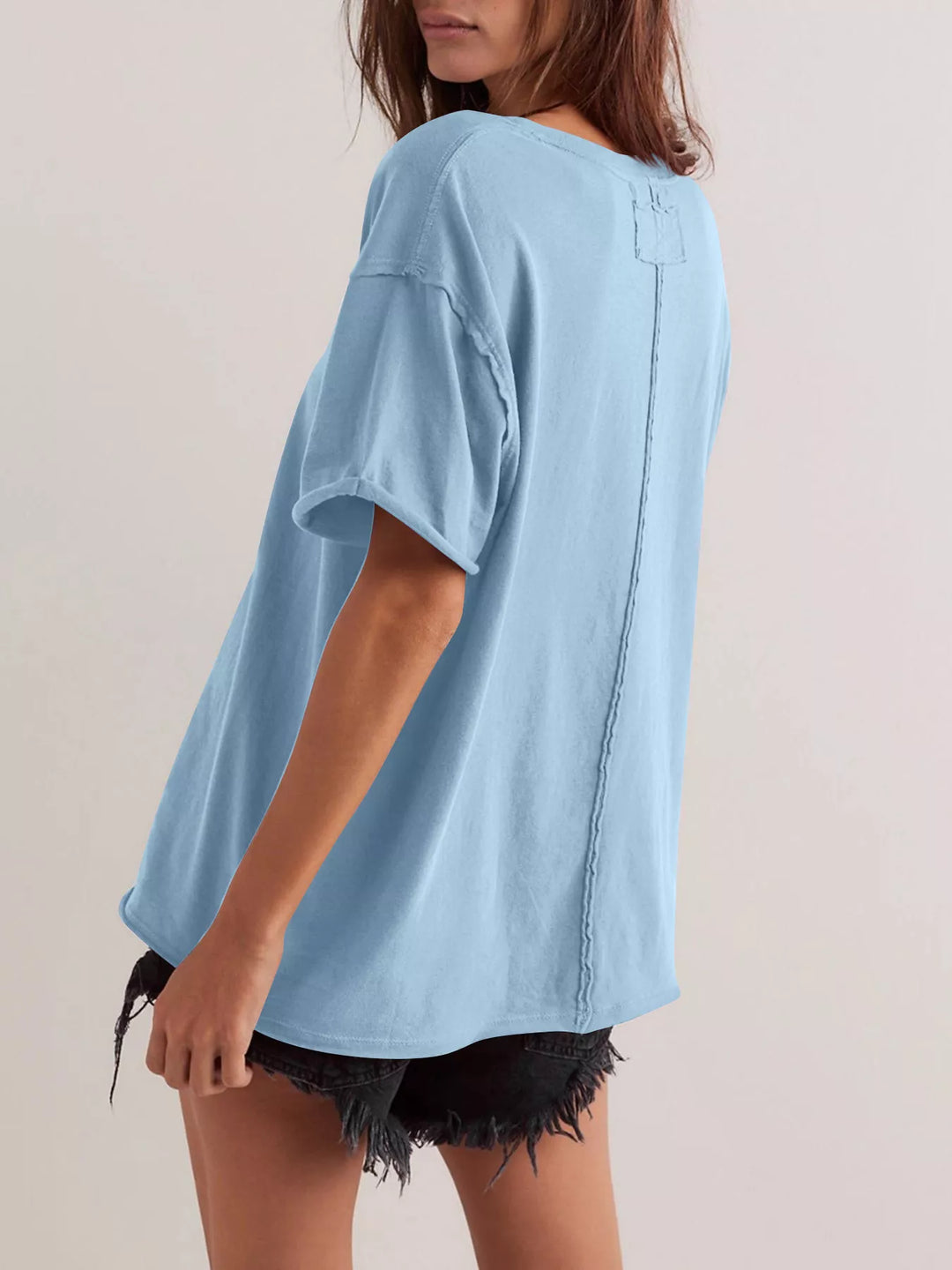 Drop-shoulder loose-fit crew neck tee with cuffed sleeves